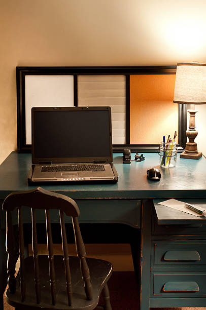 istock Vintage Desk with a Lap Top and Lamp 526726419