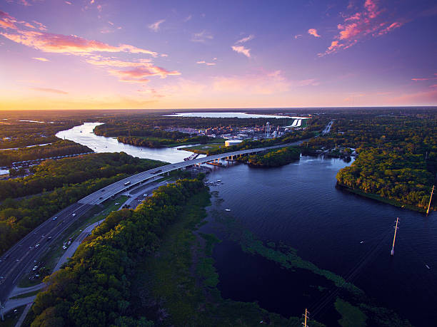 Aerial view of St. Johns River in Florida Aerial view of St. Johns River in Florida with a beautiful sunset. orlando florida stock pictures, royalty-free photos & images