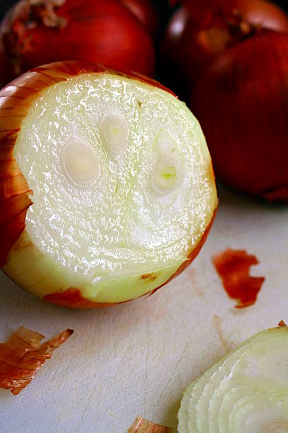 Sliced Onion On Cutting Board stock photo