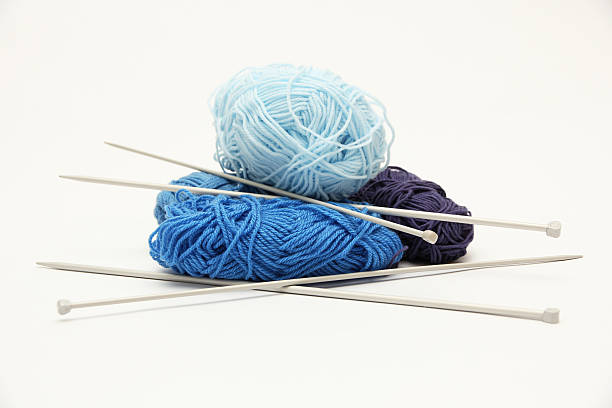 istock Pile of blue wool with needles 526727401
