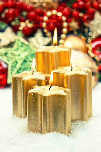 istock festive advent decoration with four burning candles 526727597