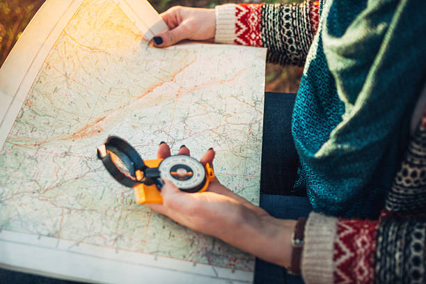 istock Compass on background of map in the forest 526728858
