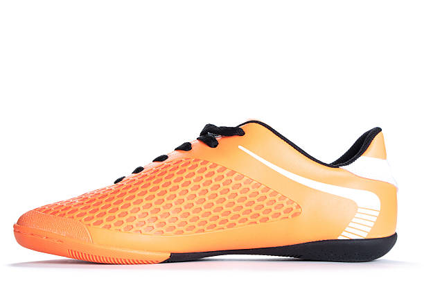 istock Sport orange shoe isolated on white background. Closeup 526729980