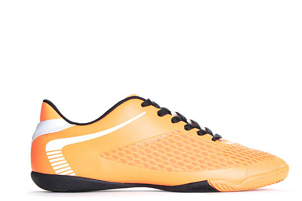 istock Sport orange shoe isolated on white background. Closeup 526730078