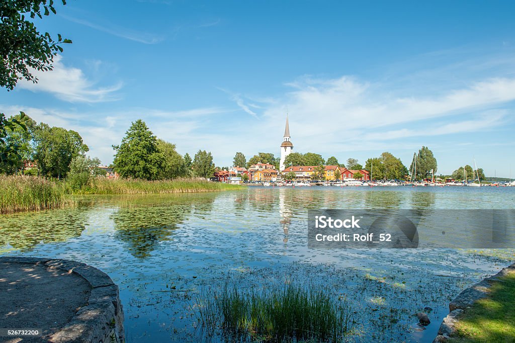 Summer in Sweden Sunny summer day in Mariefred. This historic idyllic small town on Lake Malaren is a popular tourist destination during summer. Architecture Stock Photo