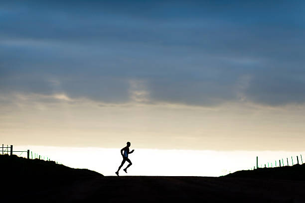 istock Jogging At The Crack Of Dawn 526744533