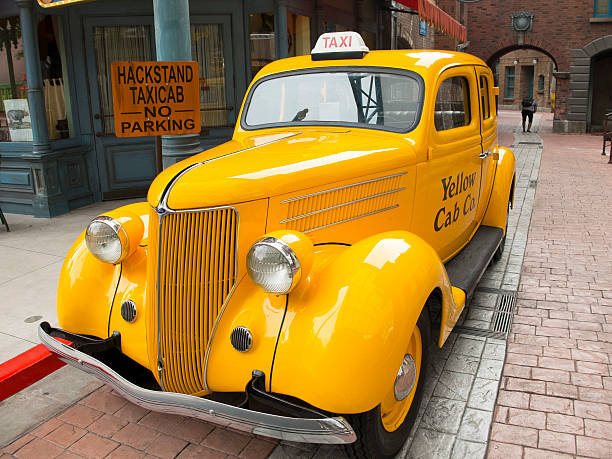 British 1936 Ford Yellow Cab Car Taxi Stock Photo - Download Image