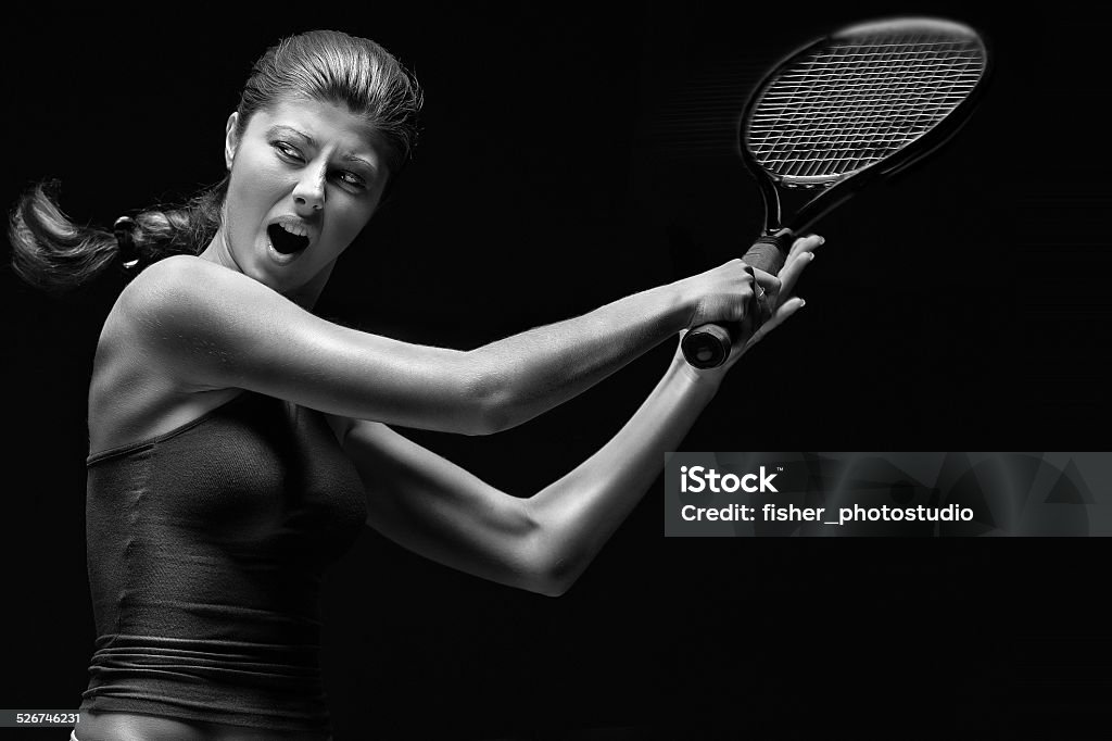 Ready to hit! A portrait of a tennis player with a racket. Activity Stock Photo