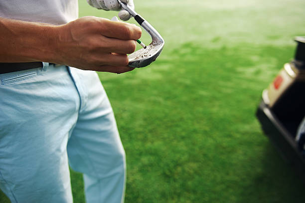 istock golf club cleaning 526746653