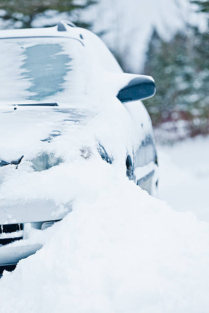 istock Car Stuck after a Snowstorm 526747527