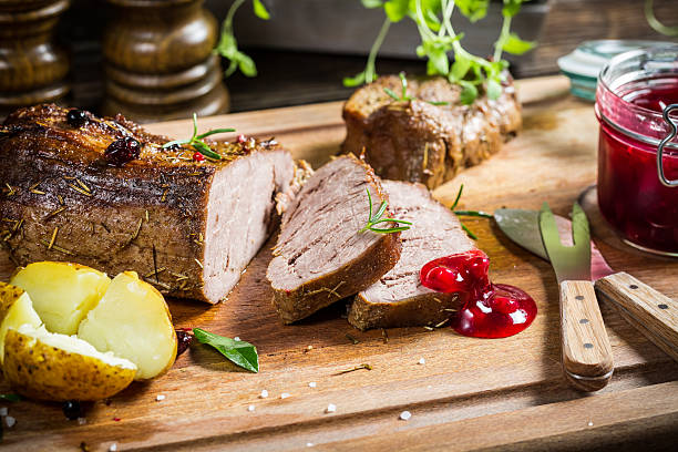 istock Venison with cranberry sauce and rosemary 526748603