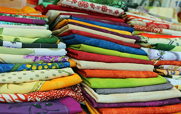 istock lots of colored cloth tablecloths for sale 526749935