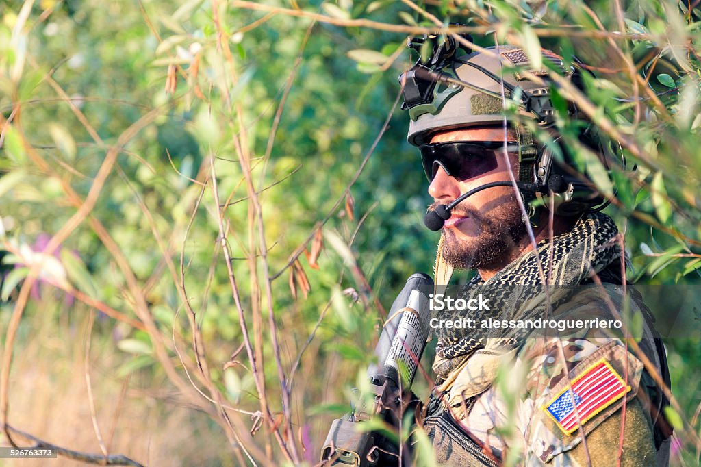 close up of American Soldier in the bushes Close up of American Soldier in the bushes USA Stock Photo