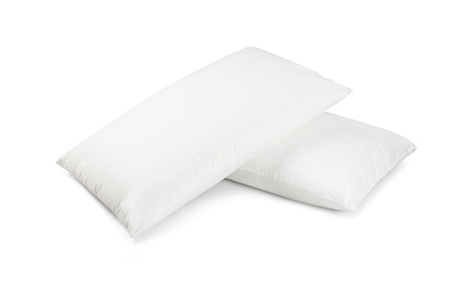 Pair of white pillows stacked, isolated on white background. For double bed