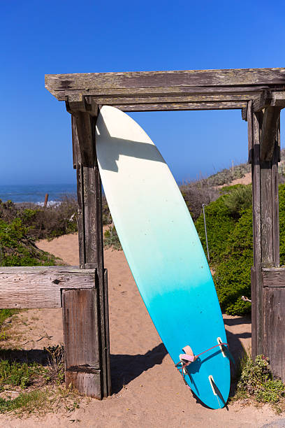 California surfboard on beach in Cabrillo Highway Route 1 California surfboard on beach in Cabrillo Highway on State Route 1 San Mateo bean hollow beach stock pictures, royalty-free photos & images