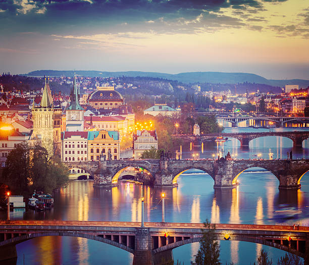 istock Panoramic view of Prague bridges over Vltava river 526764799