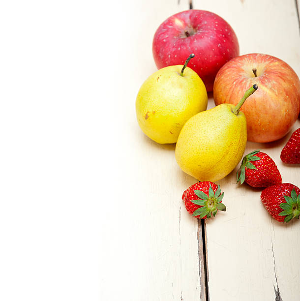 istock fresh fruits apples pears and strawberrys 526765627
