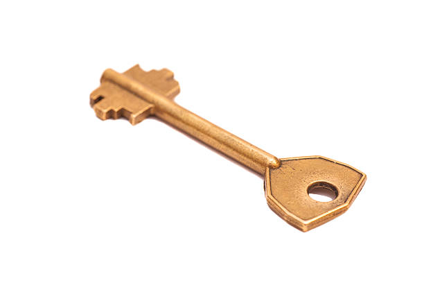 istock door key isolated on white background 526765757