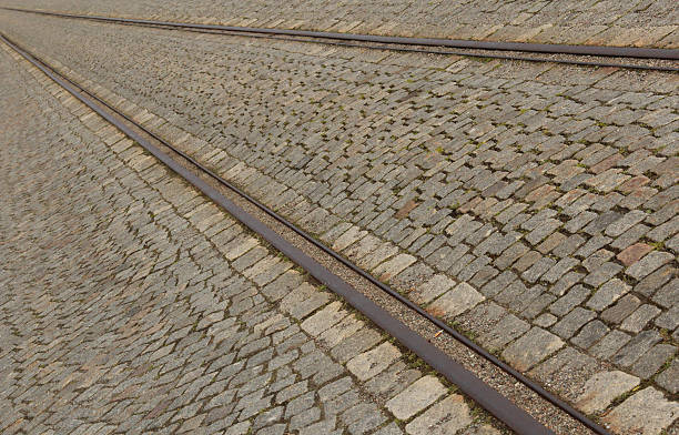 istock Cobbled street with tram rails 526765989