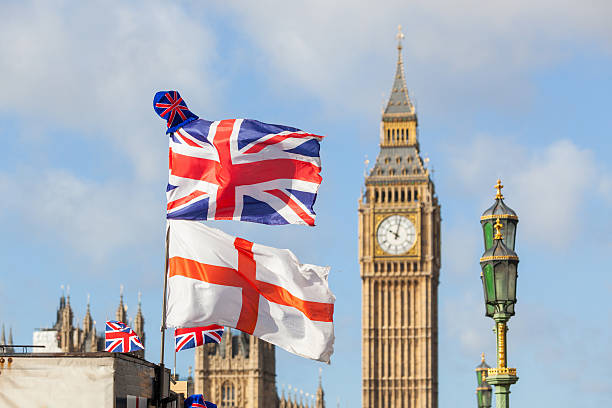 istock UK and England Flags in London 526766719