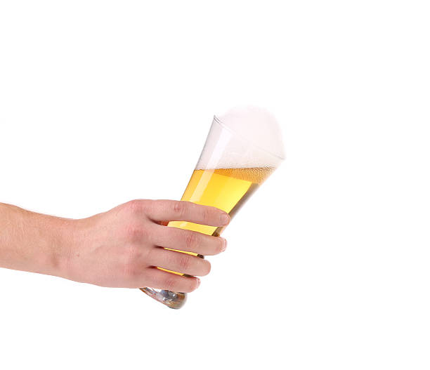 istock Glass of beer in hand. 526784997