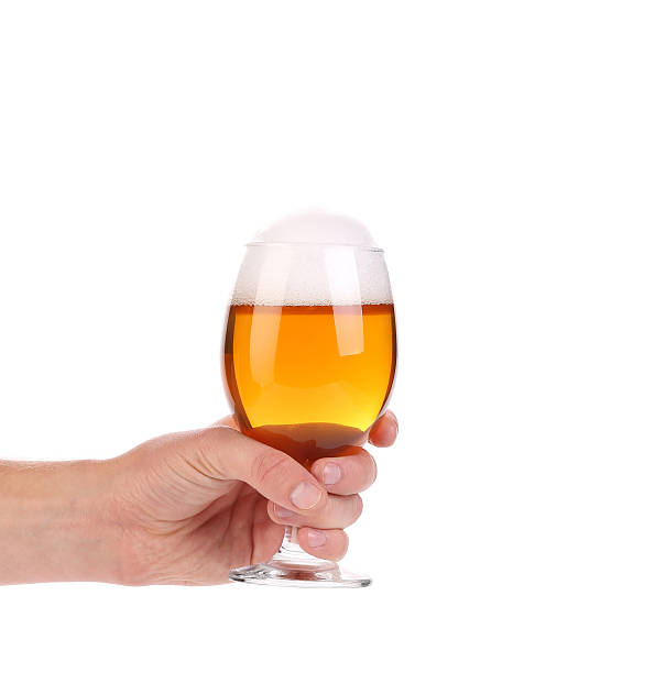 istock Glass of beer in hand. 526785137