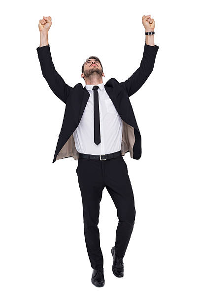 istock Cheerful businessman with arms up cheering 526785271