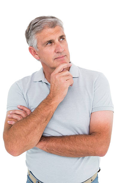 istock Casual man thinking with hand on chin 526785657