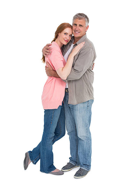 istock Casual couple hugging and smiling 526785713