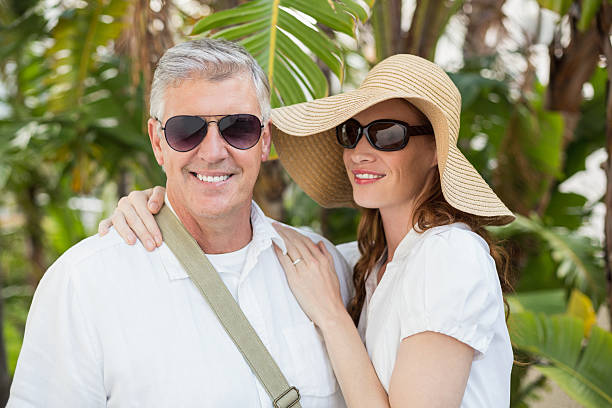 istock Holidaying couple smiling at camera 526786267