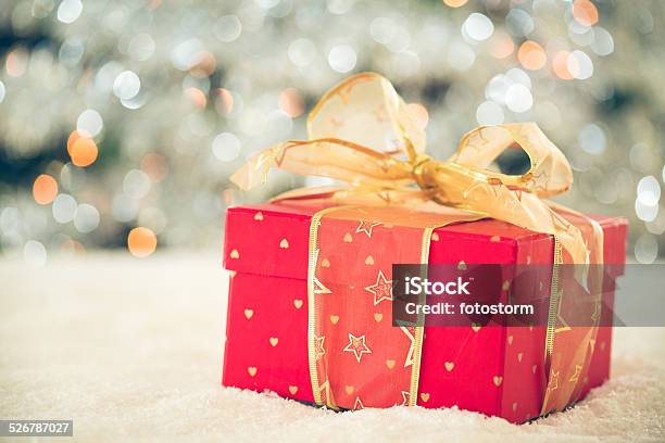 Red Christmas Present On The Snow Stock Photo - Download Image Now - Box - Container, Christmas, Christmas Decoration