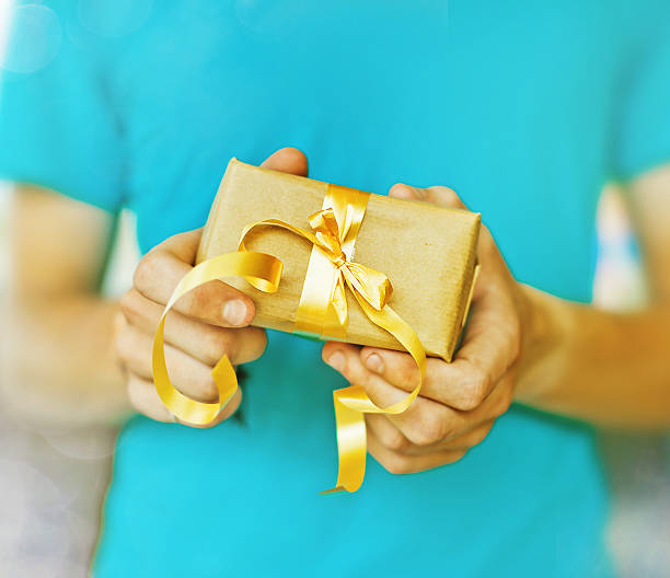 istock Christmas gift in a golden box 526787273