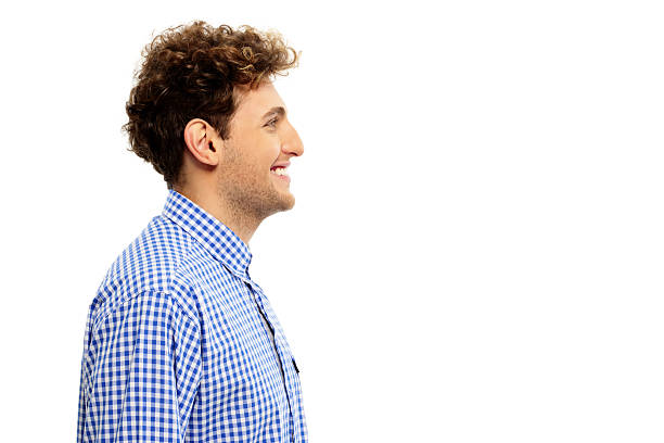 istock Side view portrait of a happy man 526789543