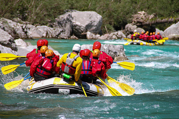 Rafting on Soča river Slovenia Whitewater rafting on Soča, the emerald river, Julian Alps, Triglav National Park. julian alps stock pictures, royalty-free photos & images