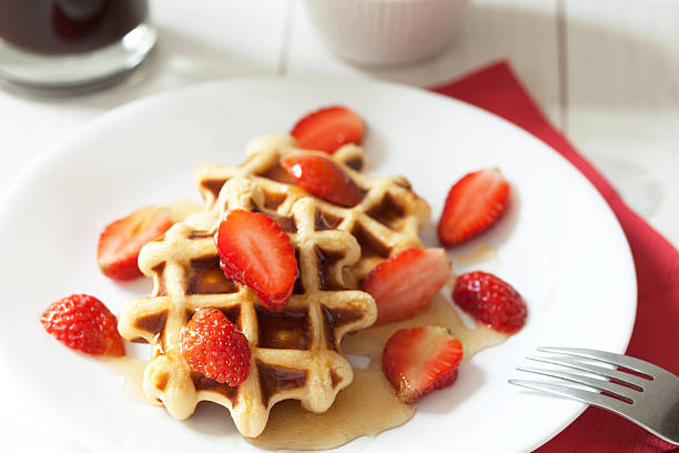 istock Waffles with honey and strawberry 526791343