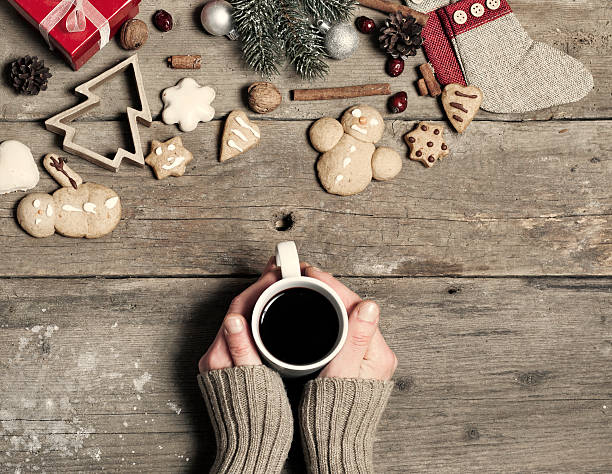 istock Christmas decorations, home made ginger bread and woman's hand o 526791707