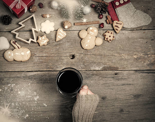 istock Christmas decorations, home made ginger bread and woman's hand o 526806215