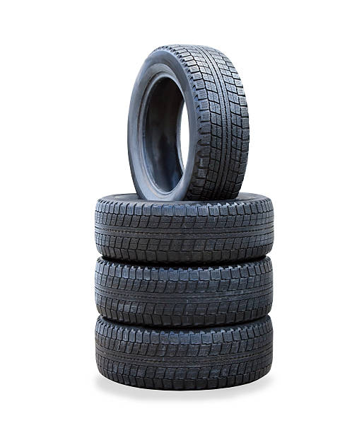 istock The stack of four winter new tires over white 526806669