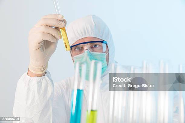 Researcher Working With Chemicals Stock Photo - Download Image Now - Chemistry, Chemistry Class, Holding