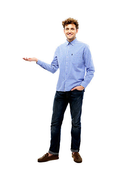 istock smiling man holding invisible product 526808141