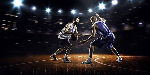 istock Two basketball players in action 526808227