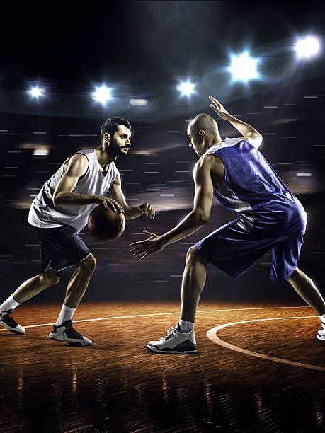 istock Two basketball players in action 526808243