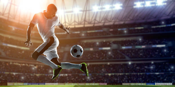 Soccer Player Kicking Ball on stadium