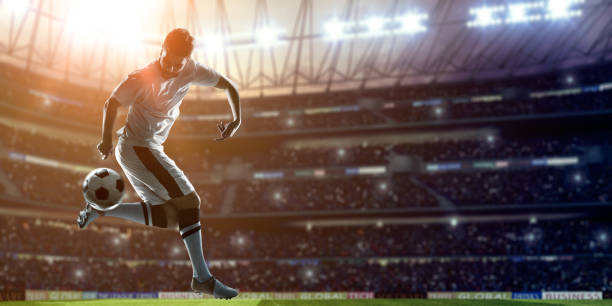 istock Soccer Player Kicking Ball on stadium 526808599