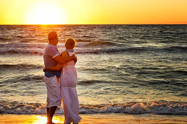 istock Mature couple on beach 526808665