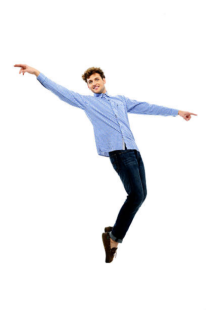istock Young male dancer posing on his toes 526810023