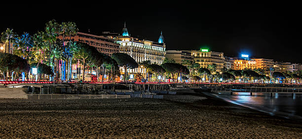 Cannes by night Cannes viewed from the beach cannes film festival stock pictures, royalty-free photos & images