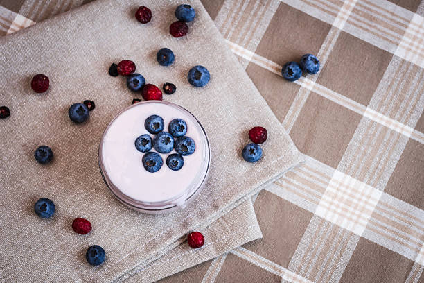 istock yogurt with berries on a napkin 526820526