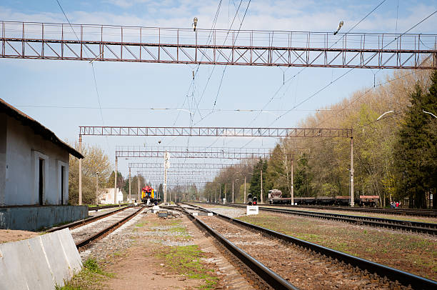 istock lonely little girl sitting on a railway platform 526821148