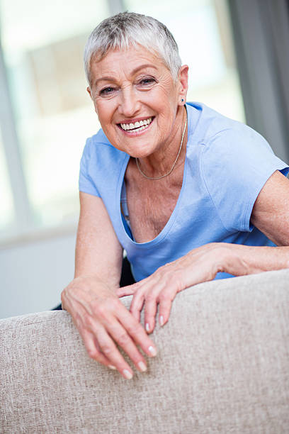 istock Smiling senior woman looking at the camera 526822478